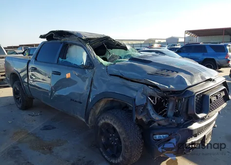 2023 Ram 1500 Rebel 4X4 5'7 Box z USA, uszkodzony, nr VIN 1C6SRFLT8PN677471